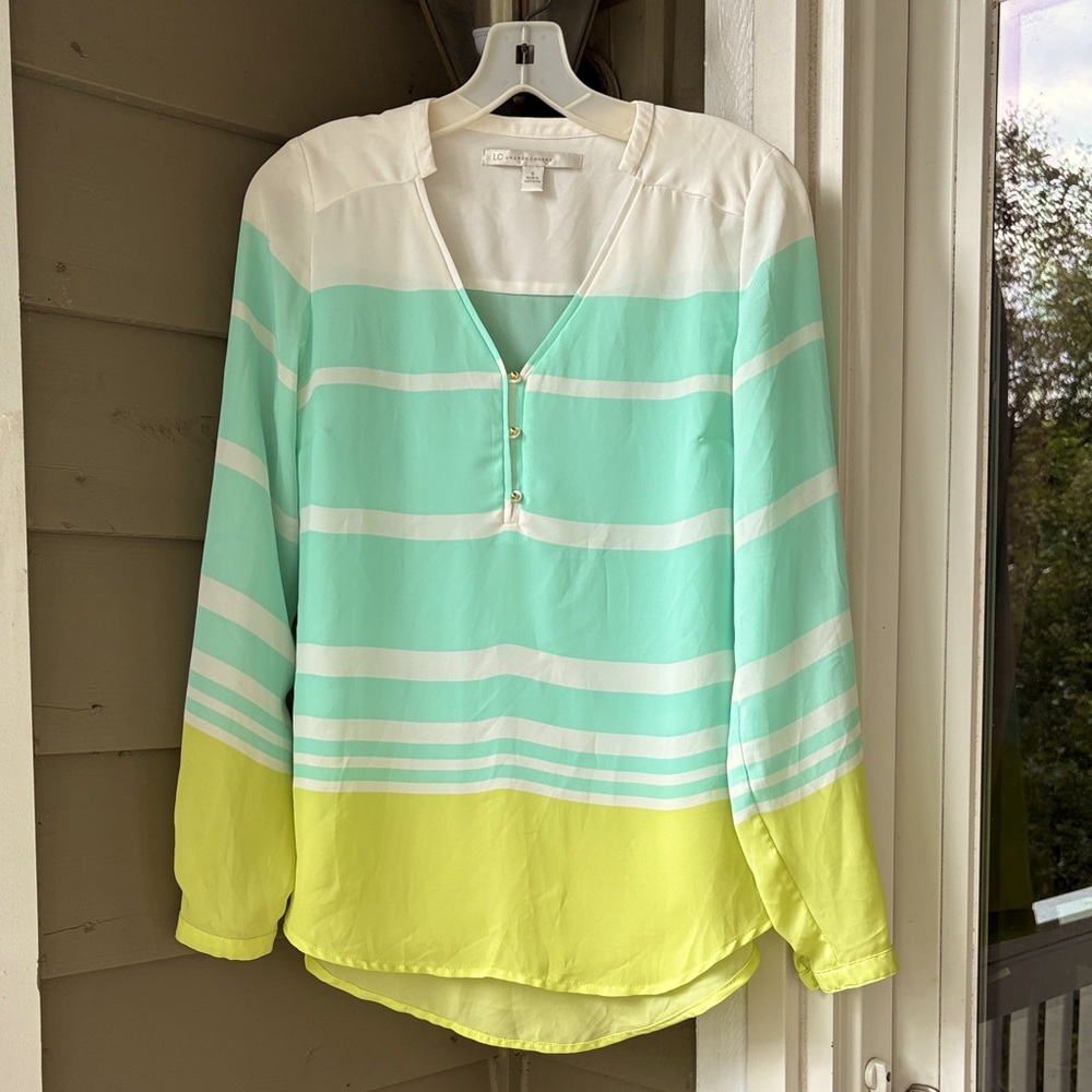 LC Lauren Conrad Beautiful Blouse. Sz Small. Longer in back. Unique neckline